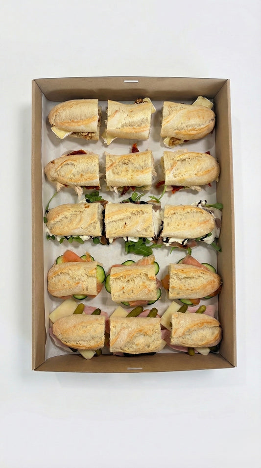 Gourmet French baguette catering box with assorted fillings for corporate lunch delivery in Brisbane CBD.