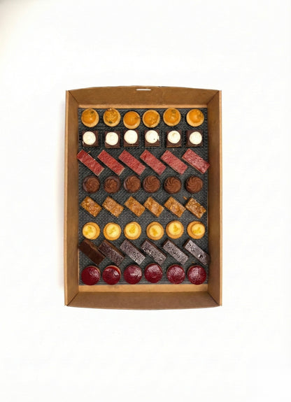 Elegant French petit four dessert platter for weddings, private parties, and high-end corporate functions.